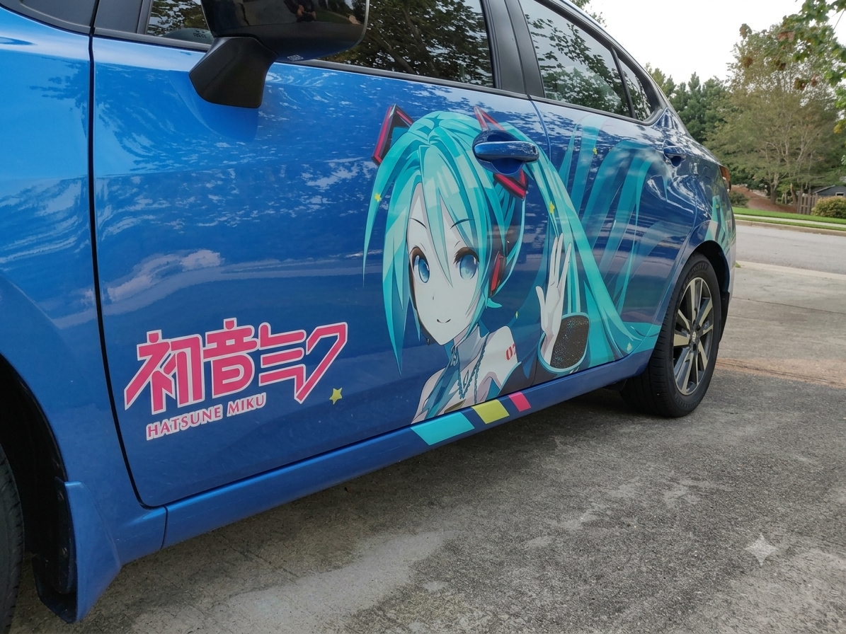 Hatsune Miku custom vehicle wrap by JMR Signs — side view